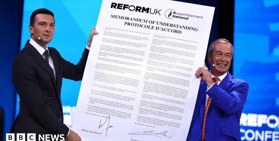 Nigel Farage Jordan Bardella handshake